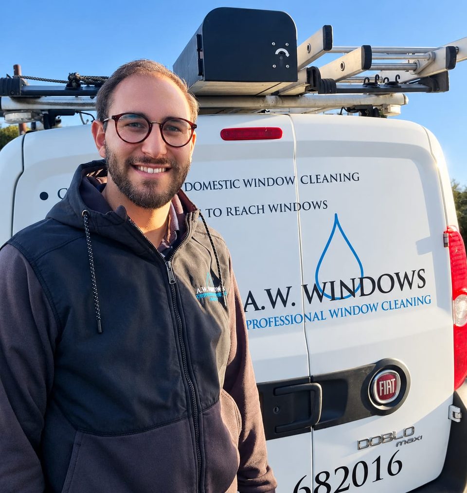 Andrew from A.W. Windows standing by his van